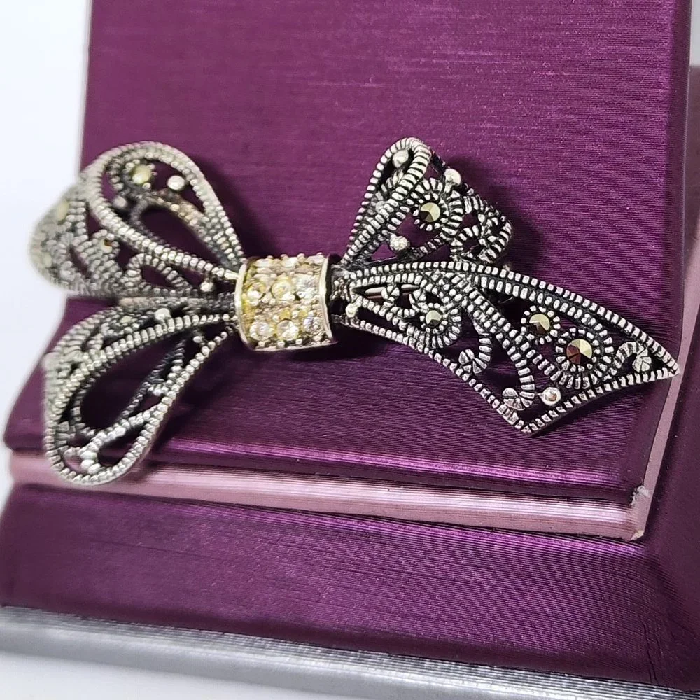 Vintage Sterling Silver Rhinestone and Marcasite Accent Bow Pin Brooch